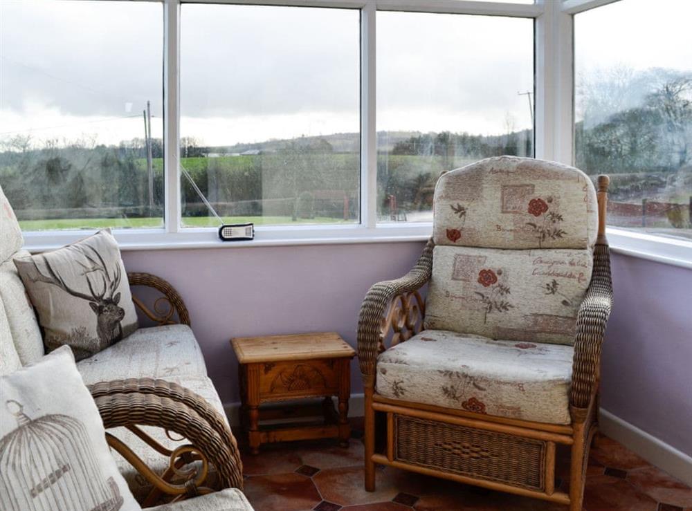Cosy seating area at Merryview Bungalow in Orcop, near Hereford, Herefordshire