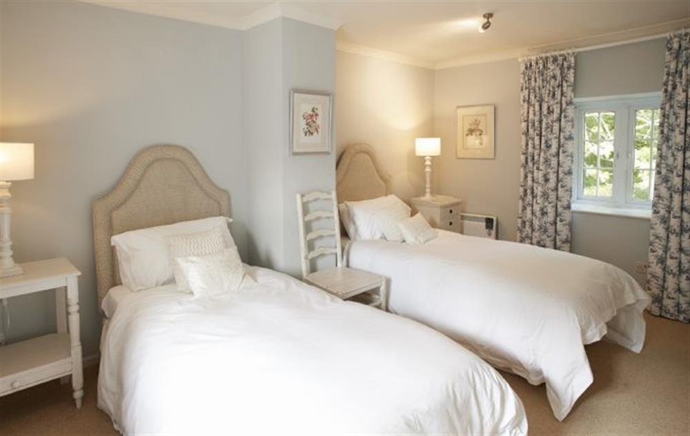 Twin bedroom with 3’ beds at Mews Cottage, Helston