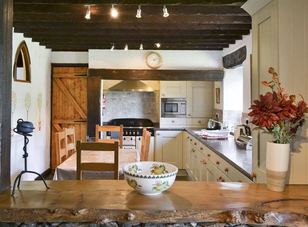 Open plan living/dining room/kitchen (photo 2) at Mews Cottage in Penrith, Cumbria