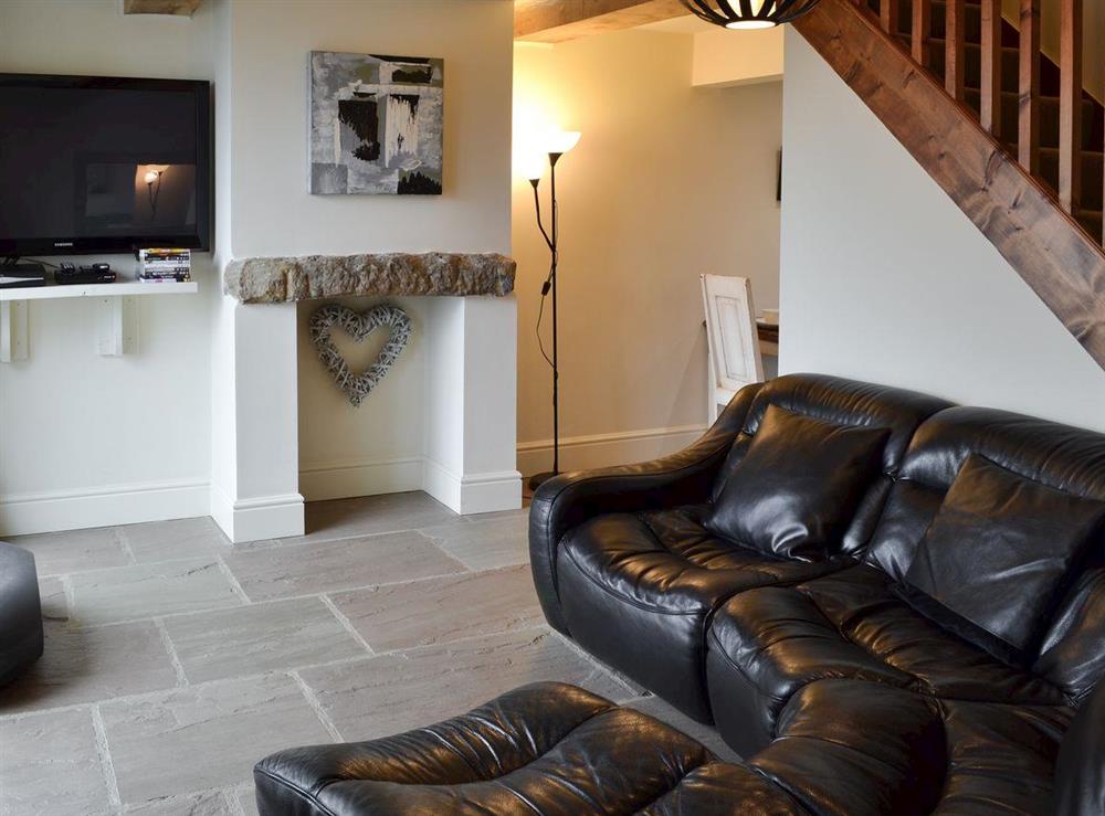 Cosy living room with underfloor heating at Mia Cottage in Buckley Green, near Haworth, Yorkshire, West Yorkshire