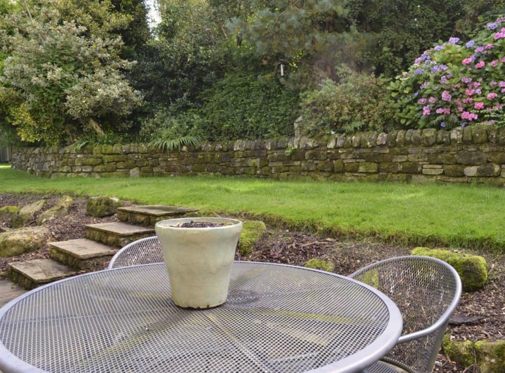 Peaceful patio area and garden at Mia Cottage in Buckley Green, near Haworth, Yorkshire, West Yorkshire
