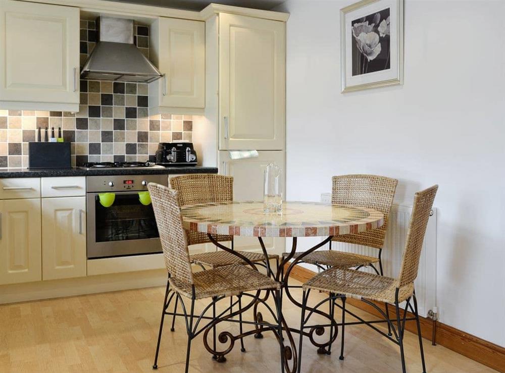 Well-equipped kitchen with dining area at Mickle Hill Mews in Gargrave, near Skipton, North Yorkshire