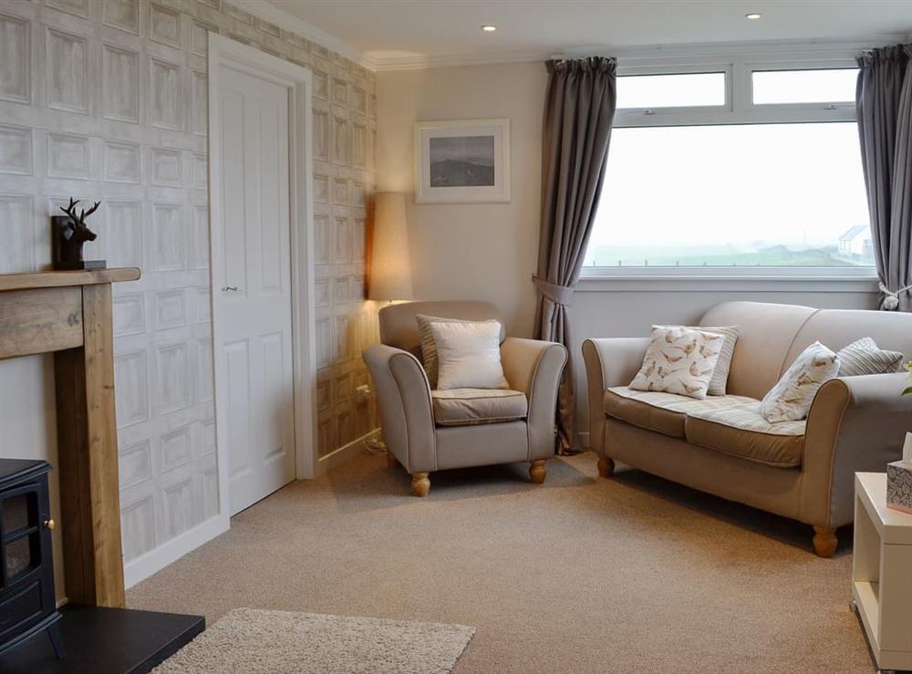 Comfortable living room at Mid Bishopton Cottage, 