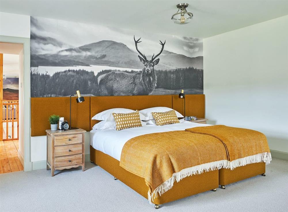 Charming bedroom with three single beds at Midcraigs in Glencraigs, near Campbeltown, Argyll