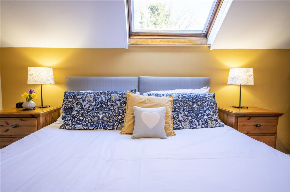 Bedroom one with 6’ super-king size bed at Middehus, Leyburn, North Yorkshire