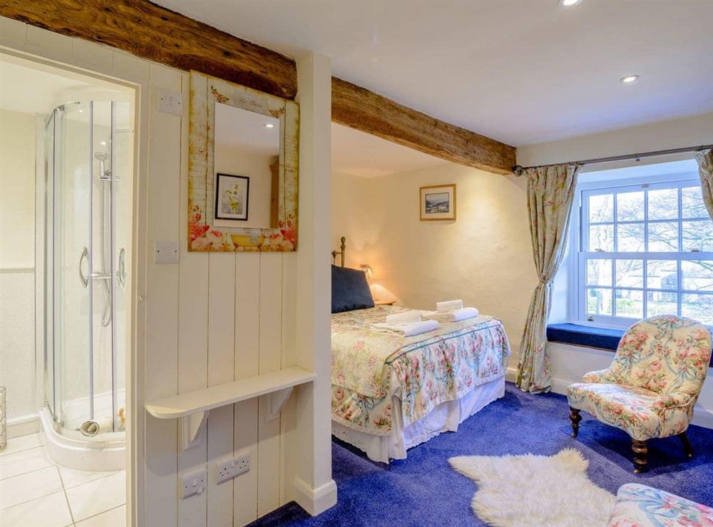 Bedroom with en-suite shower room at Middle Cottage in West Burton, near Leyburn, North Yorkshire