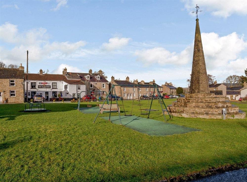 Traditional village green with children’s play area