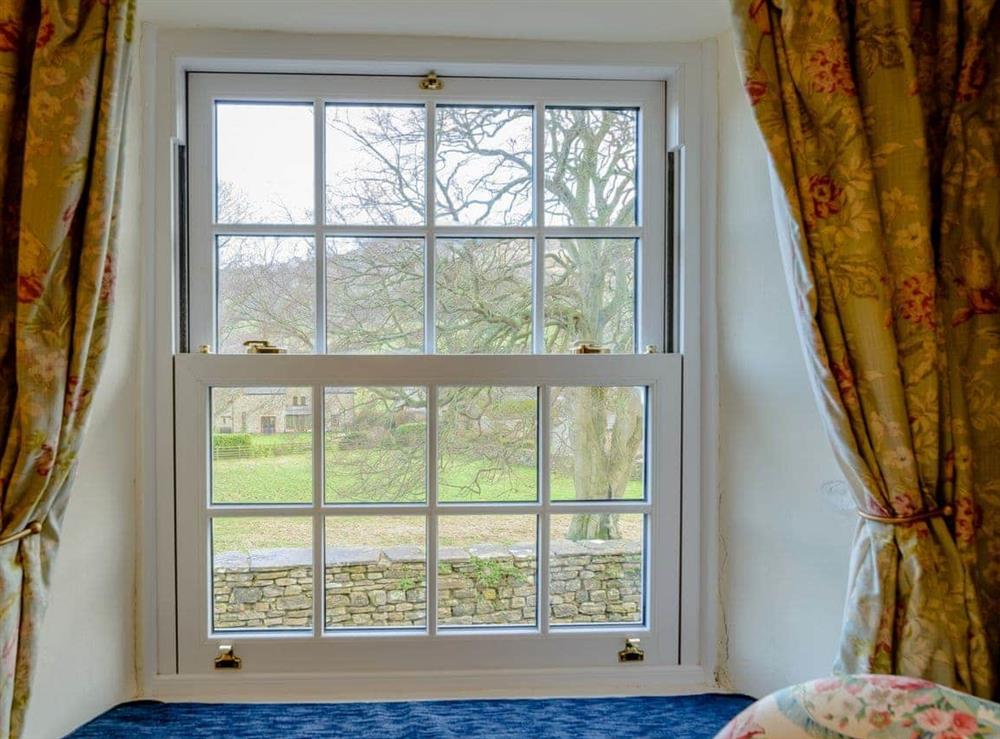 Window seat in the bedroom at Middle Cottage in West Burton, near Leyburn, North Yorkshire