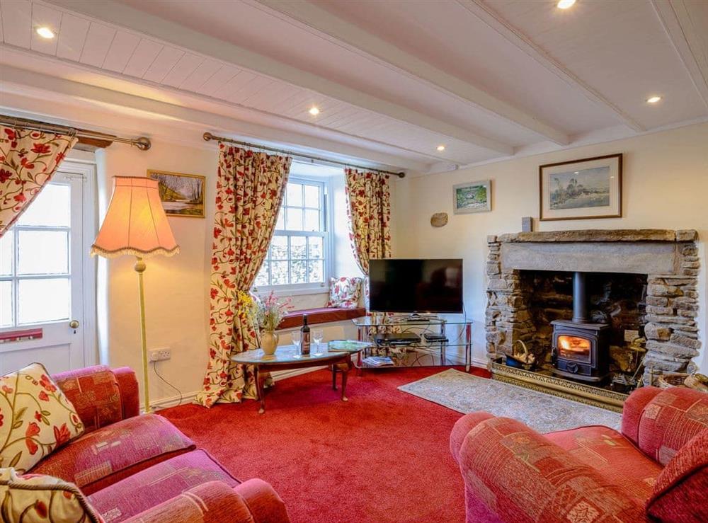 Wonderful beamed living room at Middle Cottage in West Burton, near Leyburn, North Yorkshire