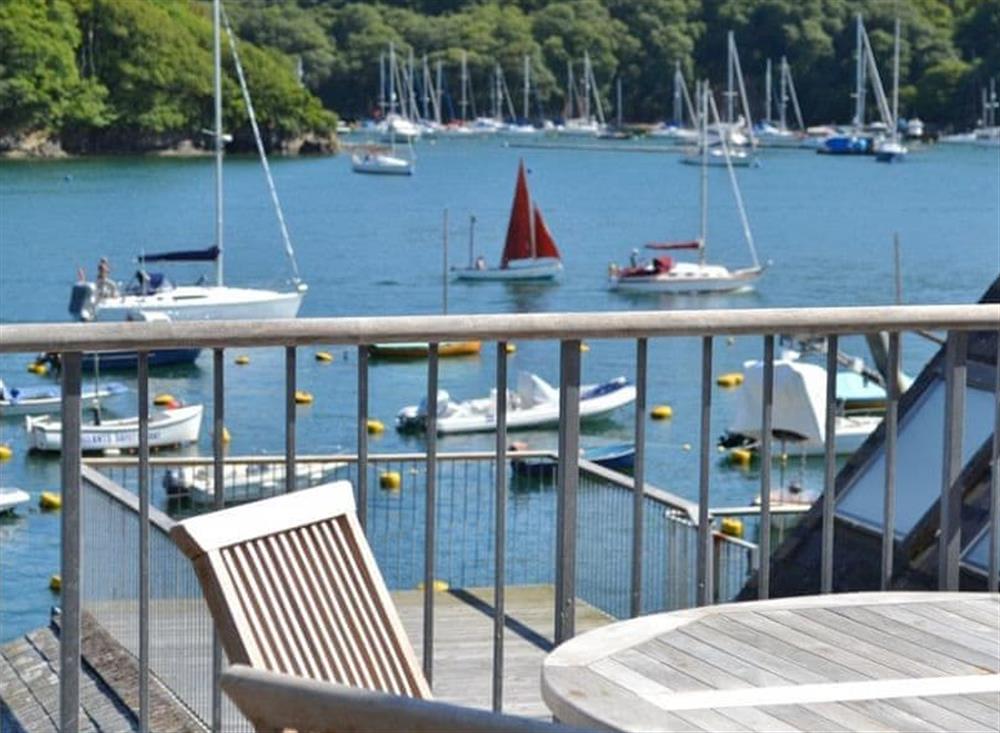Decked balcony with outdoor furniture at Middle Deck in Fowey, Cornwall