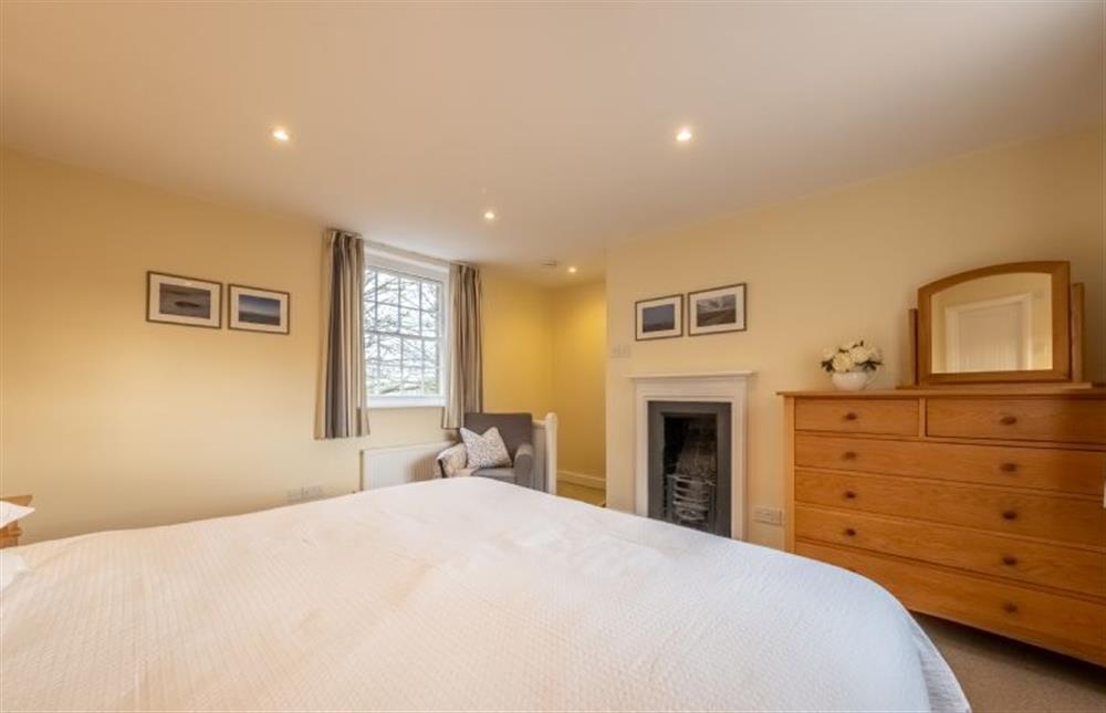 Middle Knoll: Master bedroom with a  super-king size bed (photo 4) at Middle Knoll, Cley-next-the-Sea near Holt