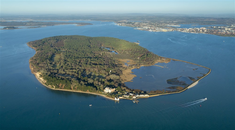 An aerial view of Brownsea Island, Dorset. Brownsea Island sits in the middle of Poole Harbour. at Middlebere Farmhouse in Isle Of Purbeck, Dorset