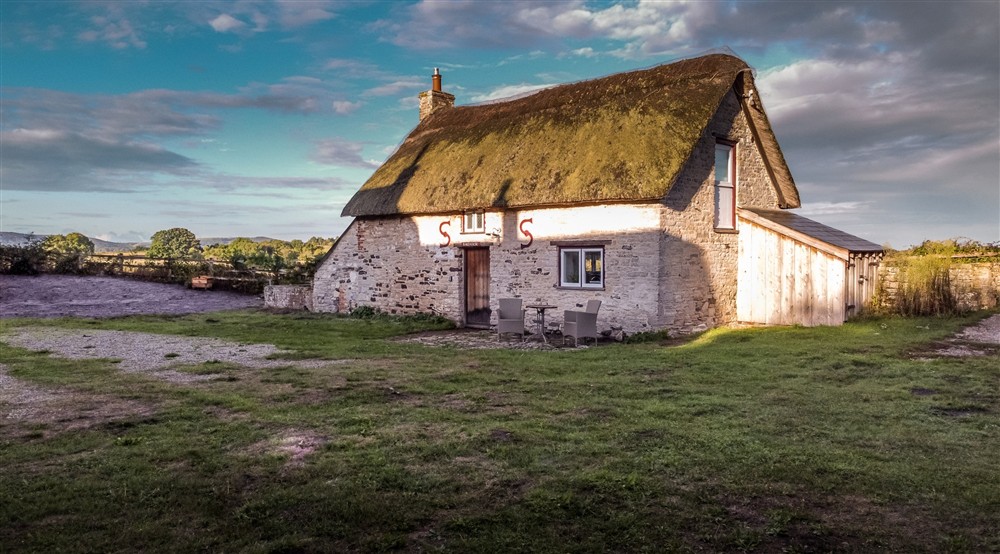 The exterior of The Bakehouse, Dorset at Middlebere Farmhouse in Isle Of Purbeck, Dorset