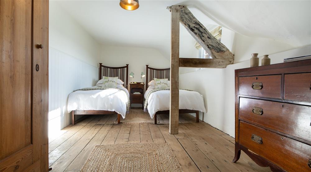 The twin bedroom at Middlebere Farmhouse in Isle Of Purbeck, Dorset