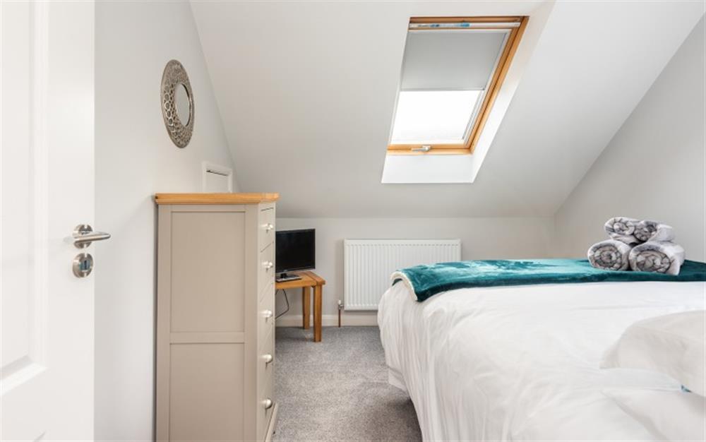 The double bedroom with countryside view. at Middlecombe Lodge in Beesands