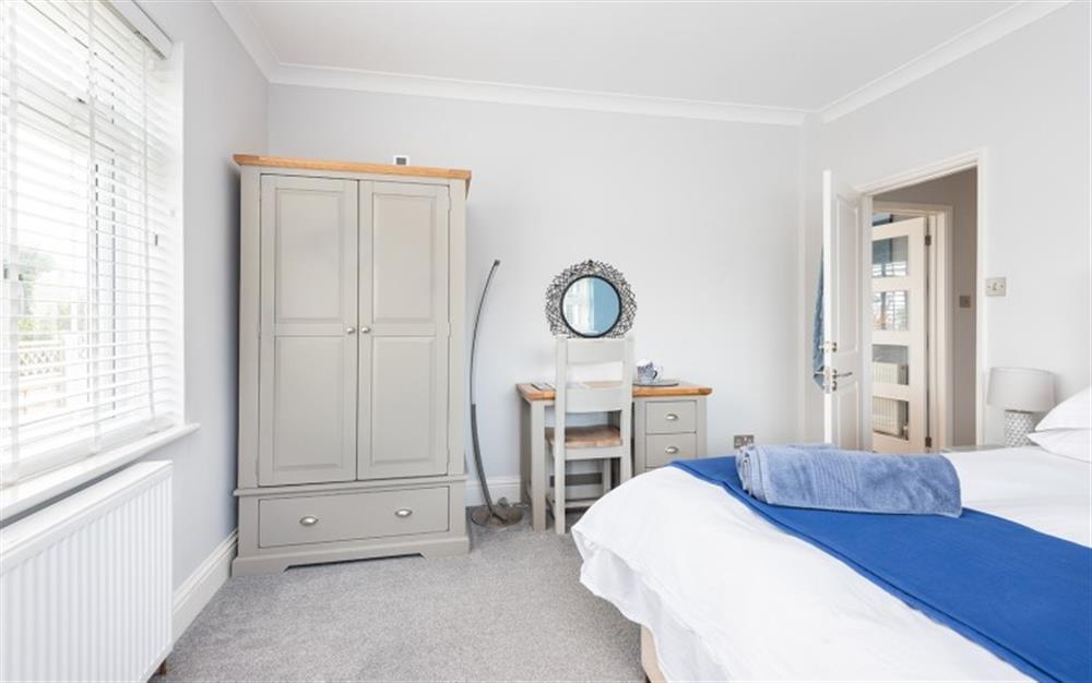 The downstairs Super king bedroom with sea glimpses! at Middlecombe Lodge in Beesands