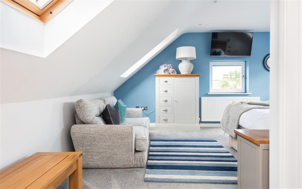 The master bedroom is large enough to use as a relaxing escape when you need time alone. at Middlecombe Lodge in Beesands
