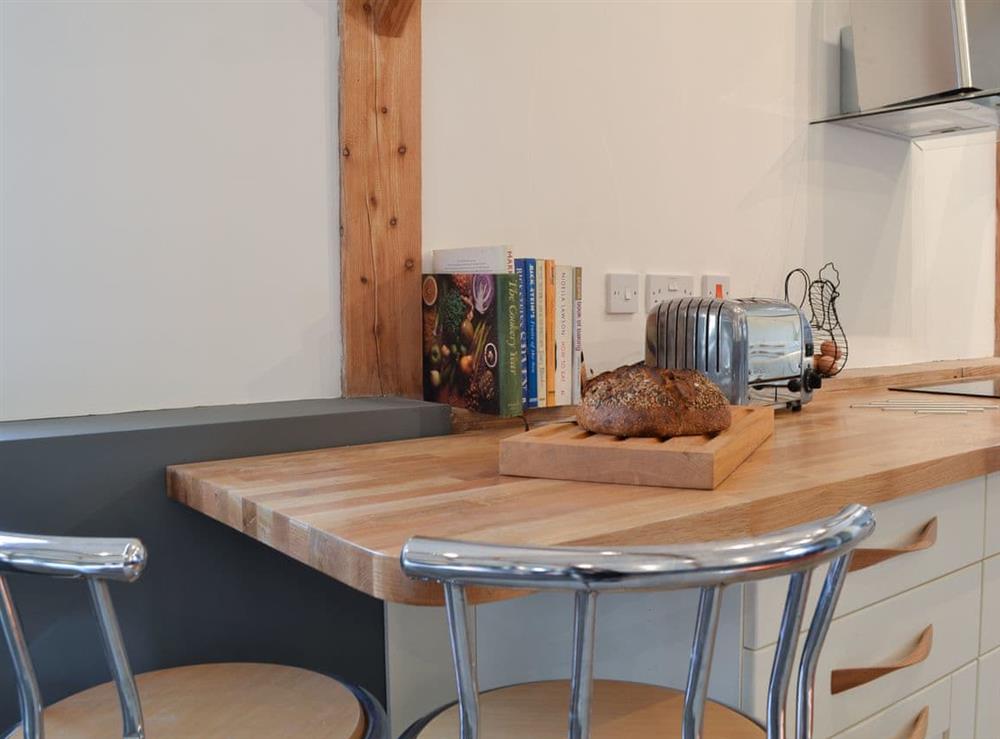 Cosy breakfast area in the kitchen at Chiddock Cottage, 