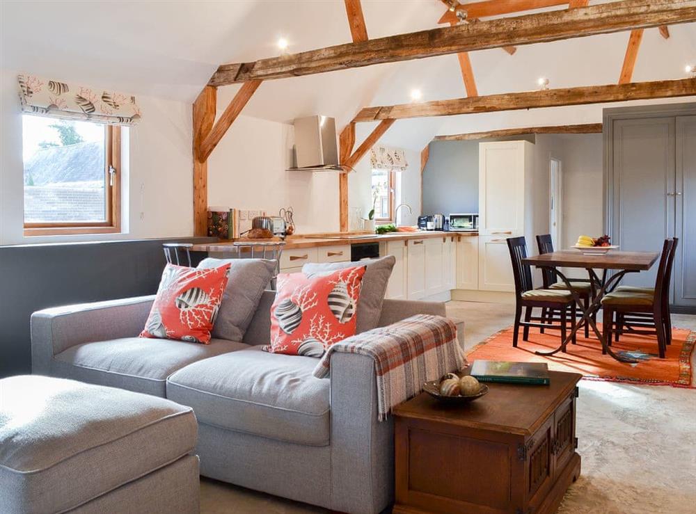 Light and airy living space with vaulted ceiling at Chiddock Cottage, 