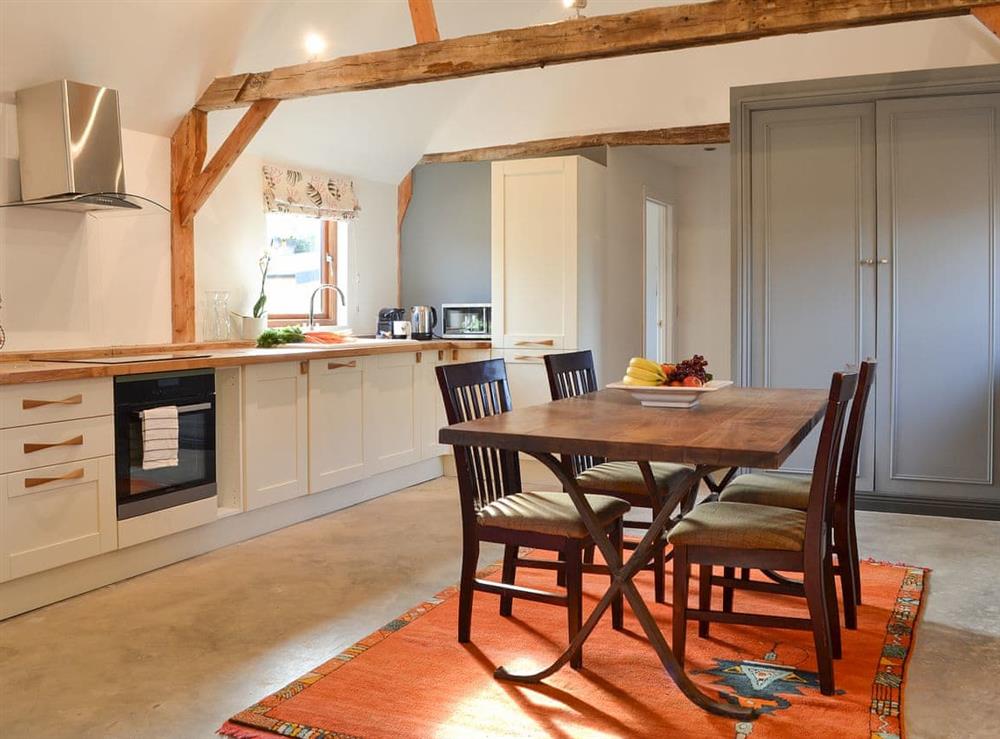 Lovely traditional kitchen/dining area with contemporary appliances at Chiddock Cottage, 