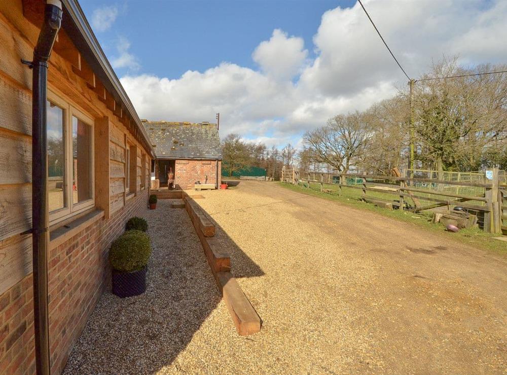 Thoughtfully restored and renovated barns in a farmyard setting at Chiddock Cottage, 