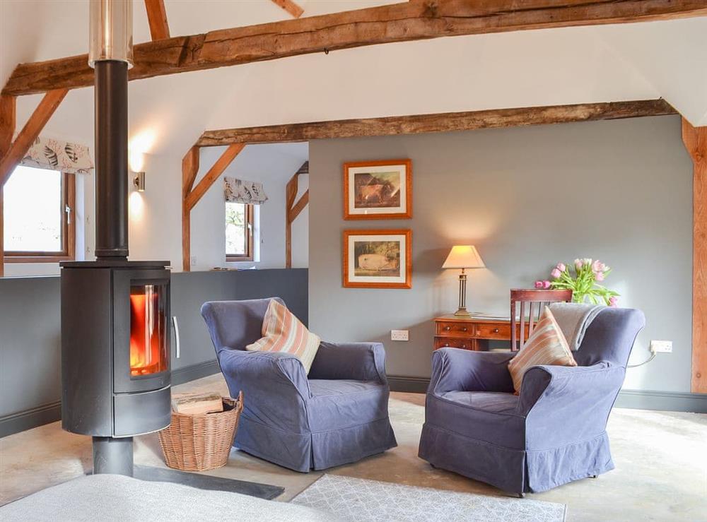 Warm and cosy open plan living space at Chiddock Cottage, 
