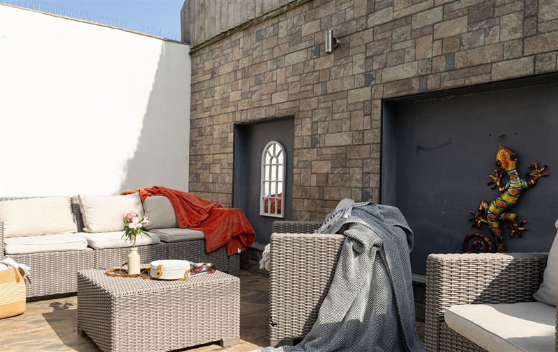 Enjoy a cup of tea on the patio at Midholm Chapel, Devon