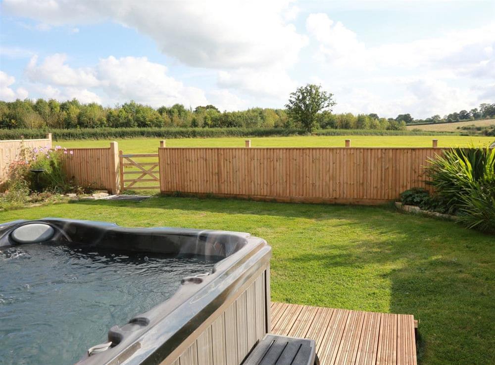 Extended garden, with far reaching views into our own fields at Midknowle Barn, 