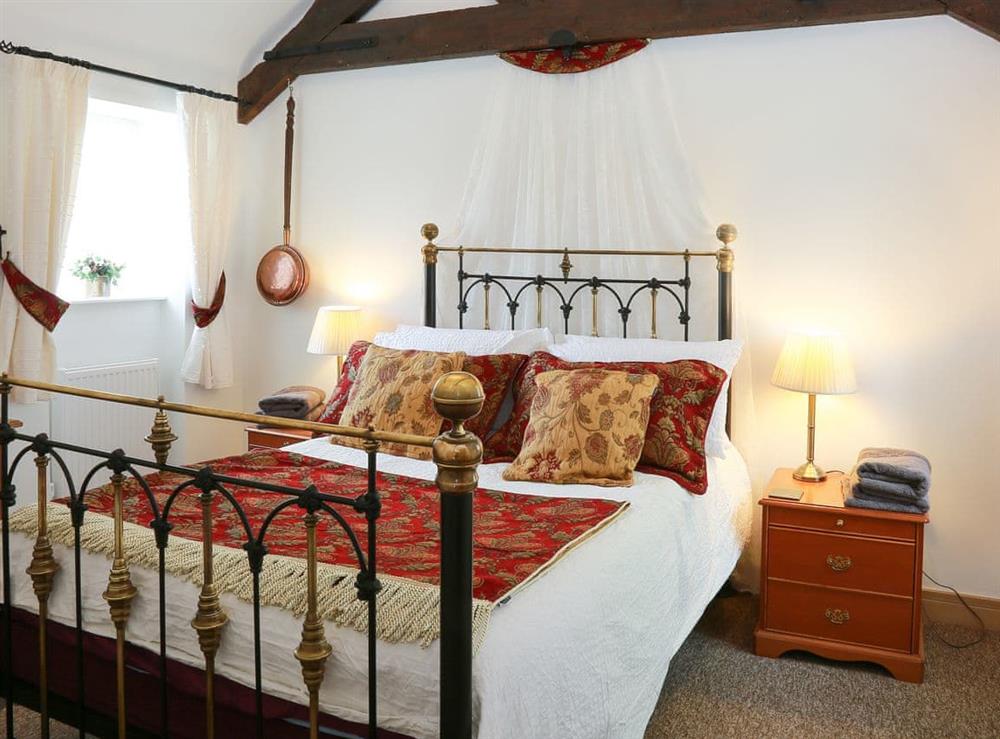 Relaxing double bedroom at Midknowle Barn, 