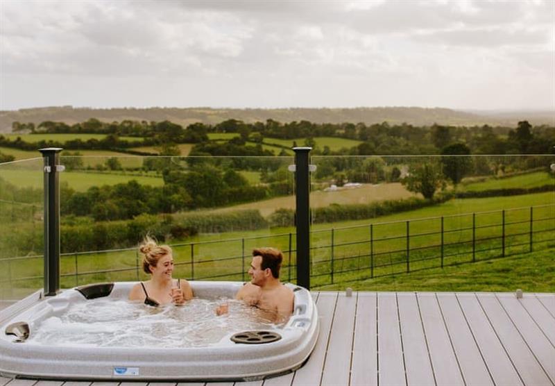 Hot tub in the Ditcheat Hill View at Midsomer Lodges in Midsomer House, East Compton