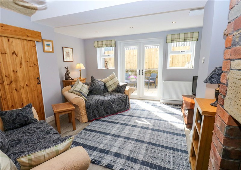 Enjoy the living room at Milburn Cottage, Haworth