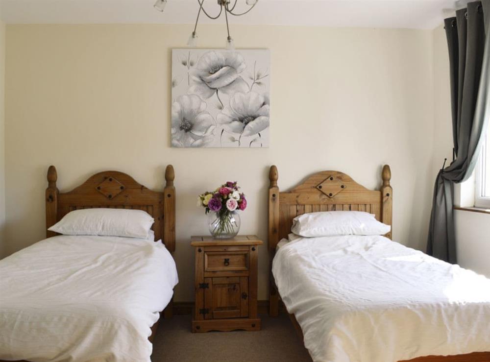 Comfy bedroom with twin beds at 8 Military Drive, 