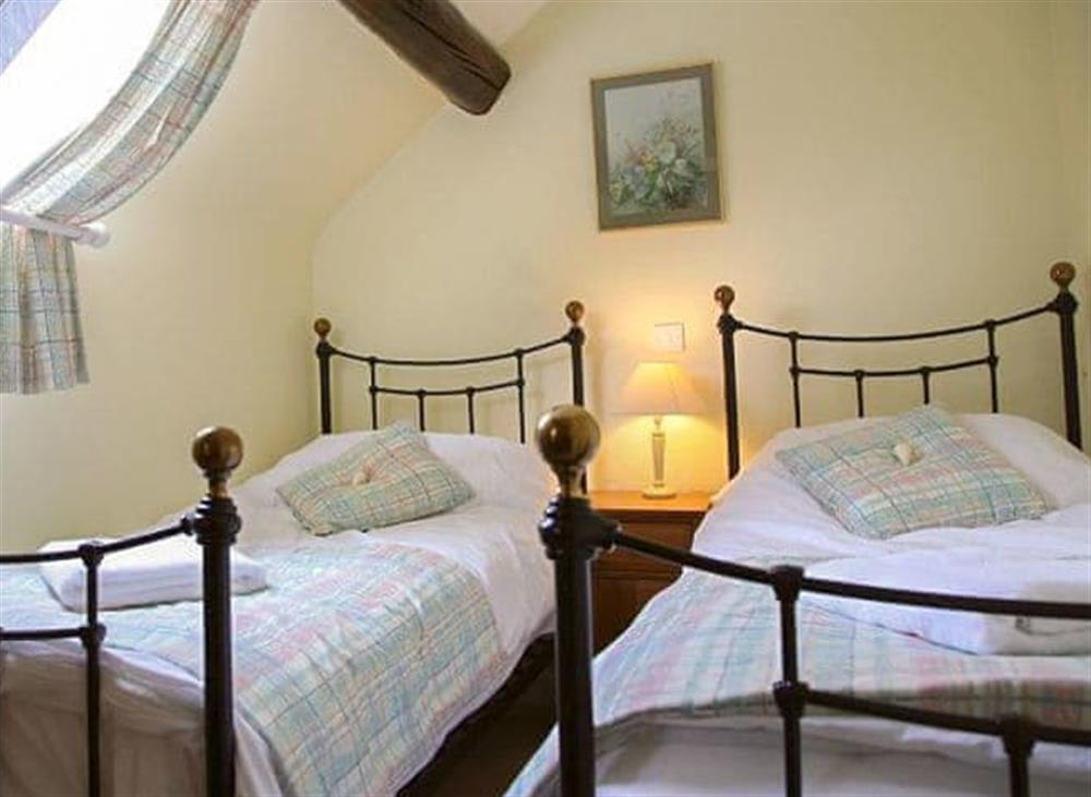 Twin bedroom at Milk Maid Cottage in Kniverton, near Ashbourne, Derbyshire