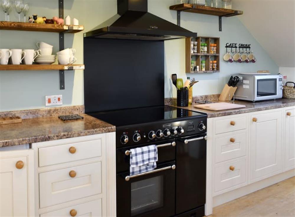 Well equipped kitchen area at Milkmaids in Polbathic, near Looe, Cornwall