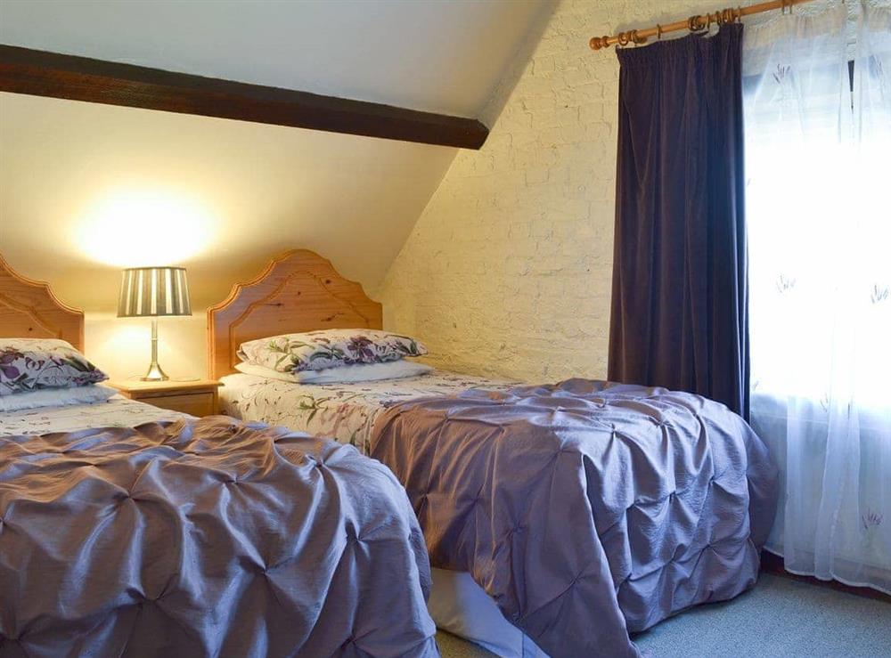 Twin bedroom at Mill Batch Cottage in Mark, Highbridge, Somerset., Great Britain