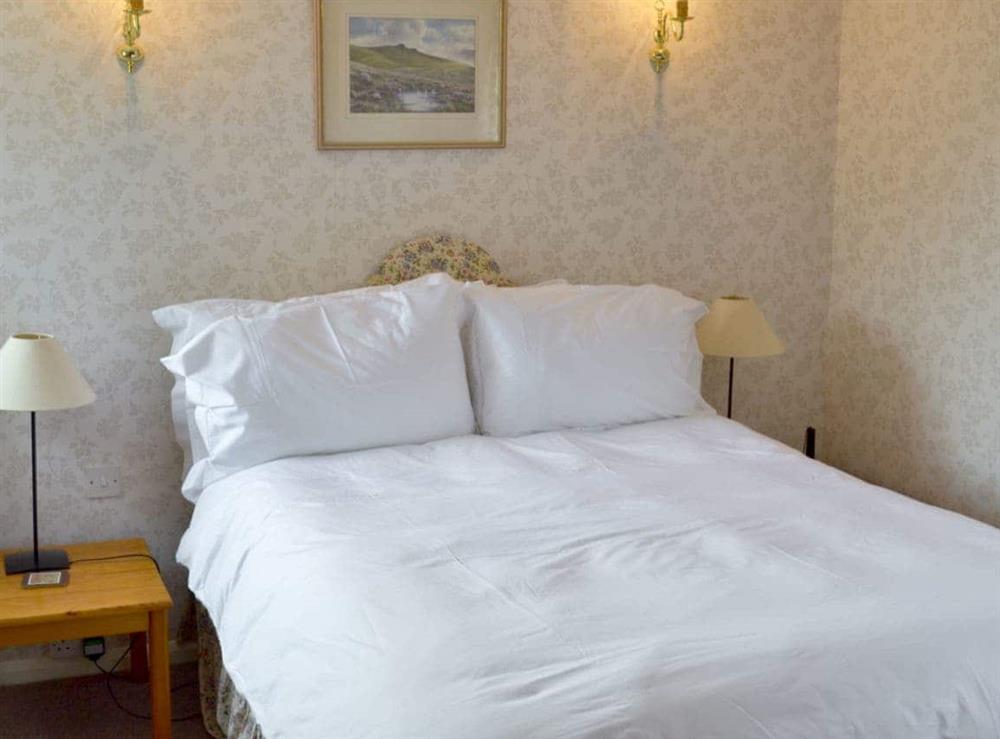 Comfortable double bedroom at Mill Cottage in Buckfastleigh, near Dartmoor, Devon