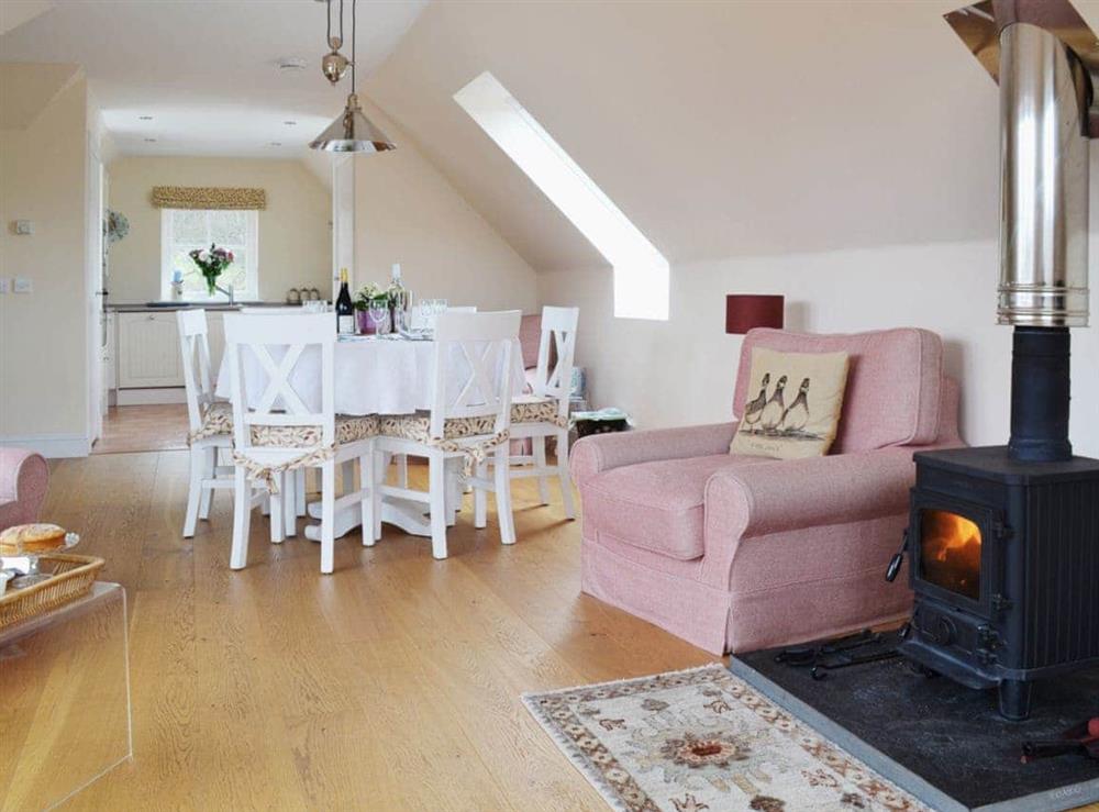 Open plan living/dining room/kitchen (photo 3) at Mill Cottage in Comrie, near Crieff, Perthshire
