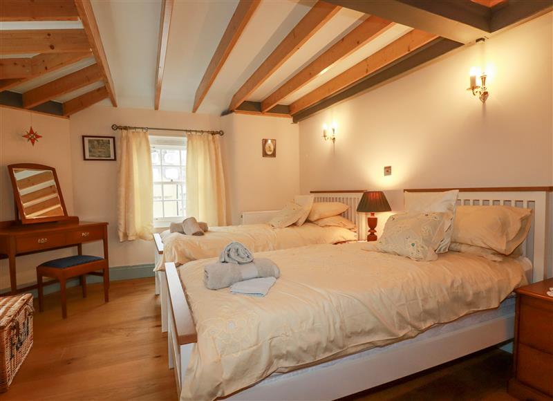 A bedroom in Mill Cottage at Mill Cottage, St Neot