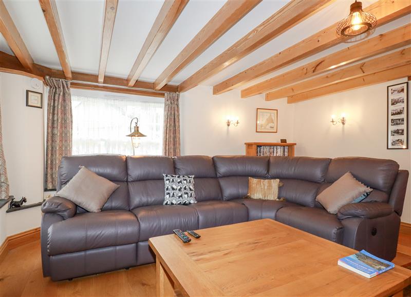 Relax in the living area at Mill Cottage, St Neot