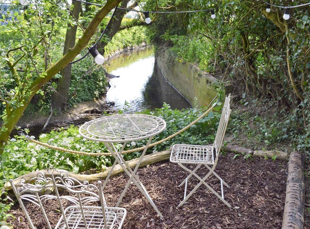 Additional sitting out area of garden at Mill Cottage in Stillington, near York, North Yorkshire