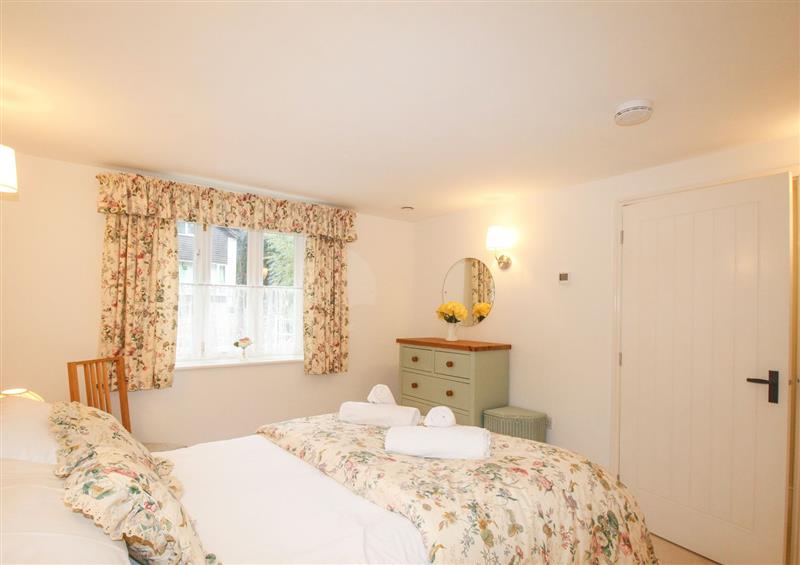 A bedroom in Mill Cottage at Mill Cottage, Upwey