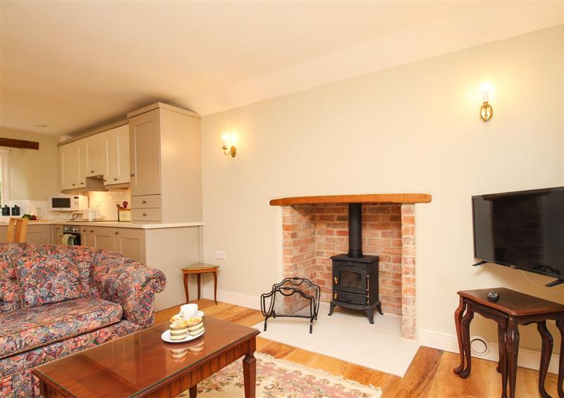 Relax in the living area at Mill Cottage, Upwey