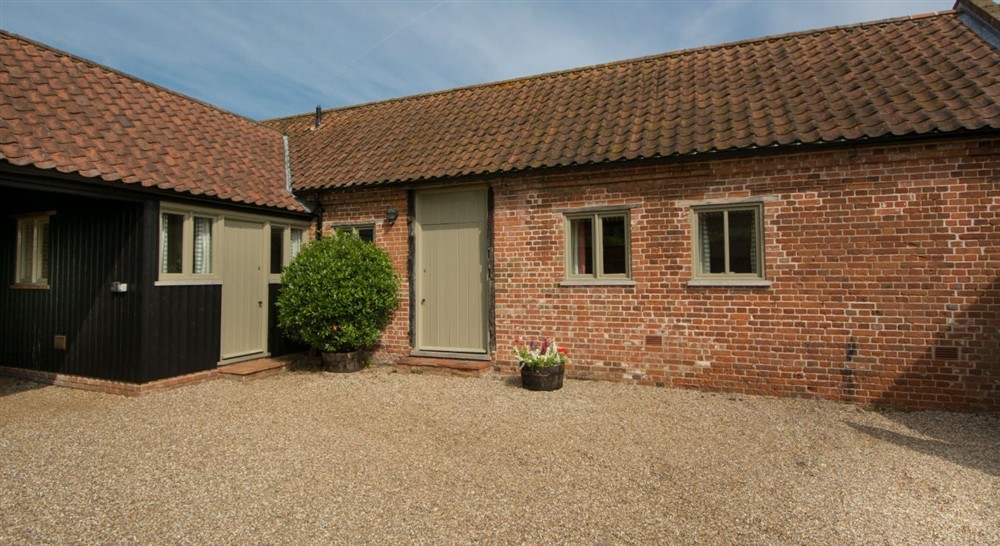 The brick exterior of Mill Farm Barn, nr Aylsham, Norfolk (photo 2) at Mill Farm Barn in Norwich, Norfolk