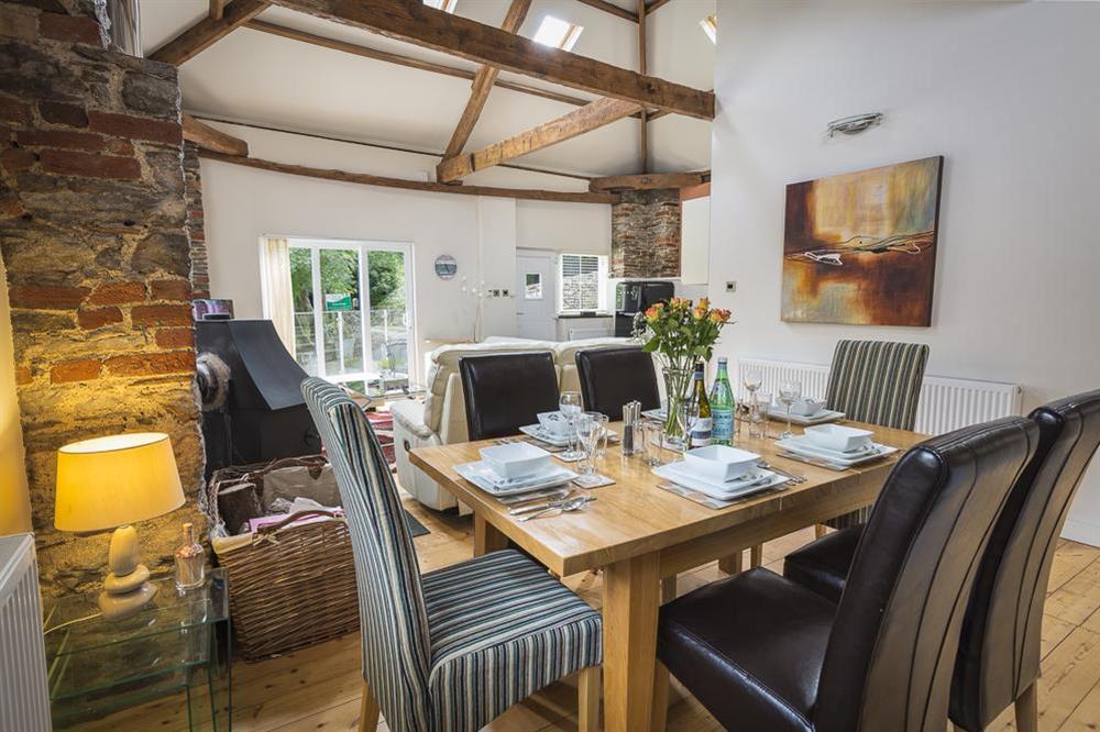 Dining area with oak table seating six at Mill Grange in , Dartmouth