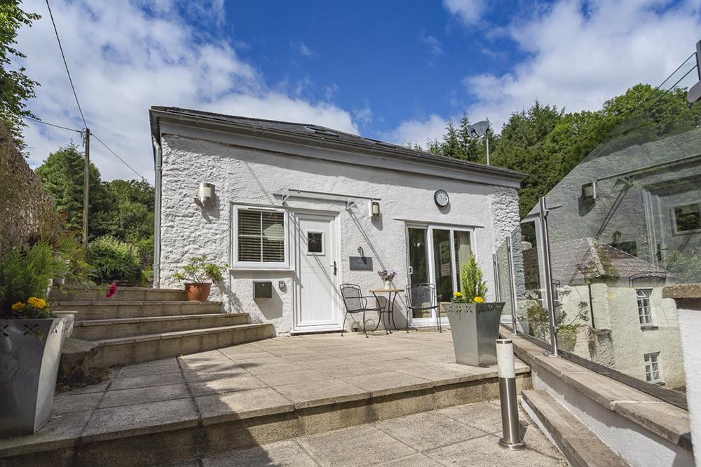 Entrance and front terrace with table and chairs at Mill Grange in , Dartmouth