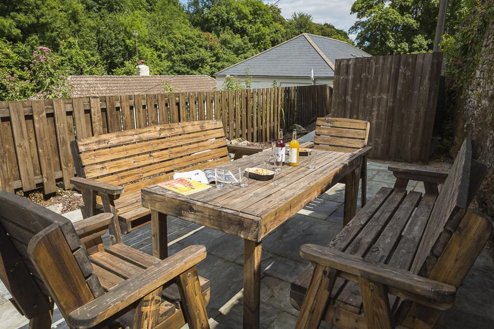 To the side/rear is a larger terrace ideal for al fresco dining and late sunny evenings at Mill Grange in , Dartmouth