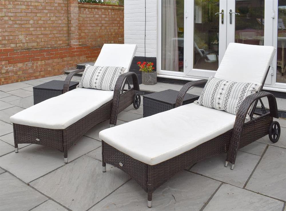 Paved patio with outdoor furniture