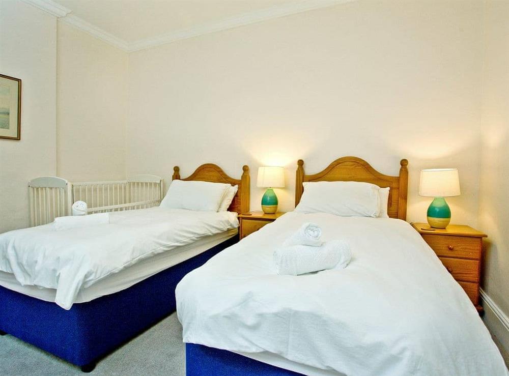 Charming twin bedroom at Mill Lodge in Bow Creek, Nr Totnes, South Devon., Great Britain