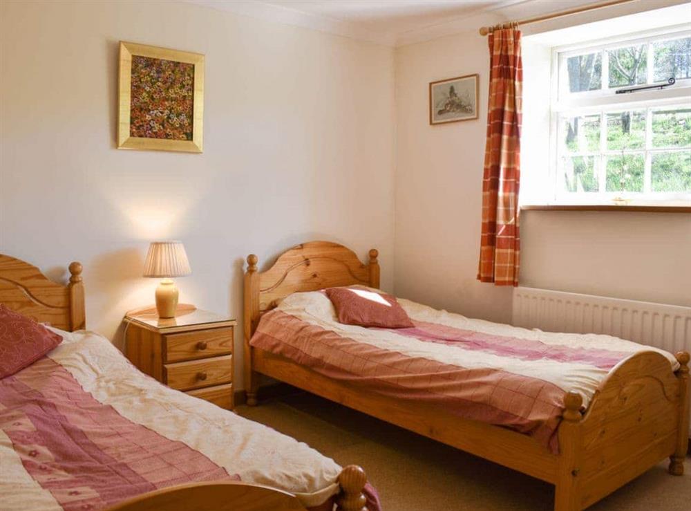 Twin bedroom at Mill Pond Cottage in Bere Regis, Dorset