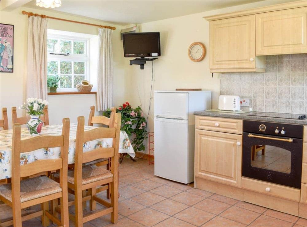 Well equipped kitchen/ dining room at Mill Pond Cottage in Bere Regis, Dorset